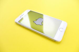 snapchat logo on phone