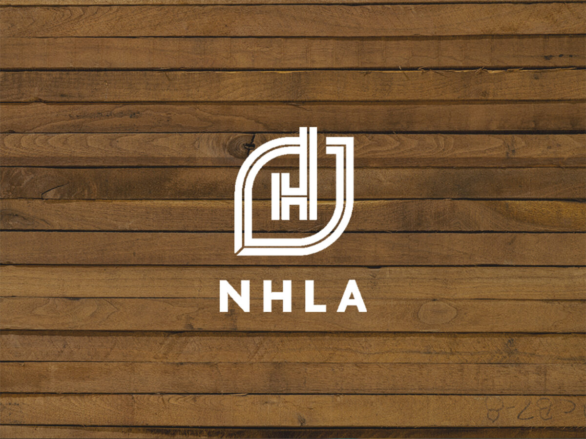 NHLA logo overlaid on a stack of hardwood planks.